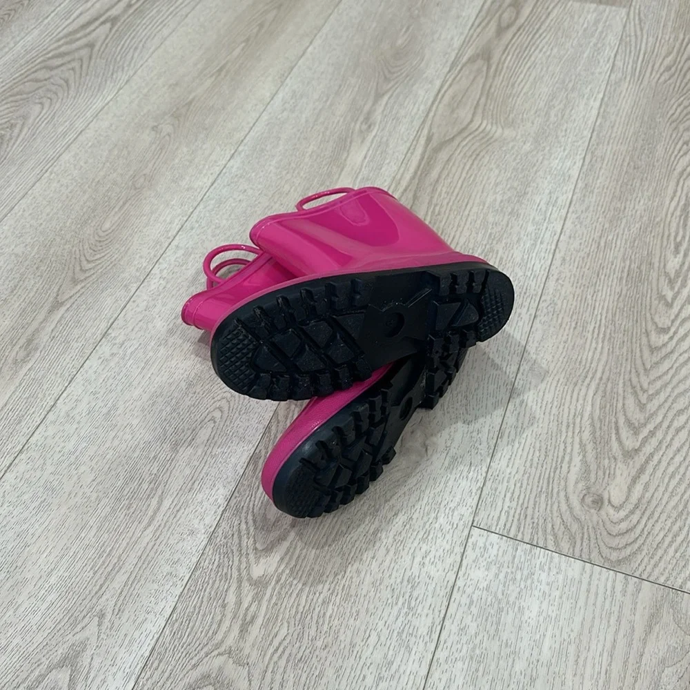 Pink rain boots